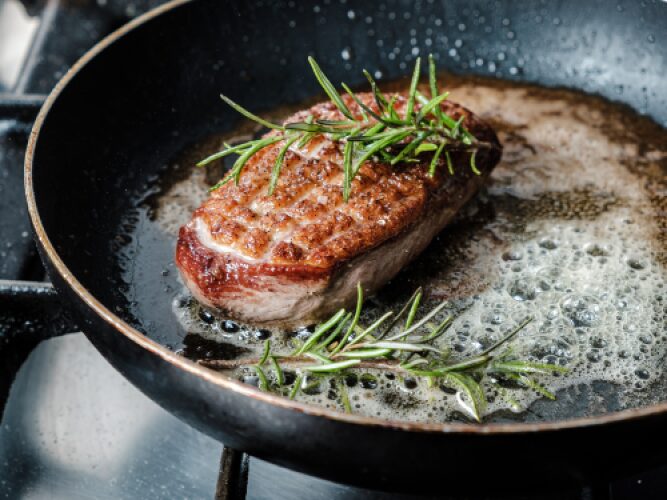 Essential Ingredients Every Home Kitchen Needs for French Cooking 1 duck breast frying in butter