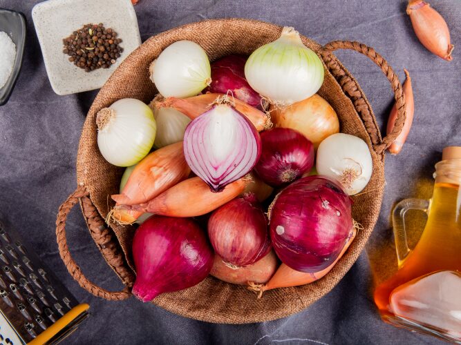 Essential Ingredients Every Home Kitchen Needs for French Cooking 2 garliconionshallotsbasket
